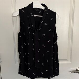 Ann Taylor Black Sleeveless Blouse with White Pattern
